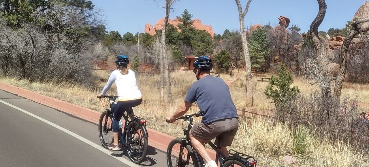 Guided mountain bike tour Garden of the Gods red rock formations Colorado Springs